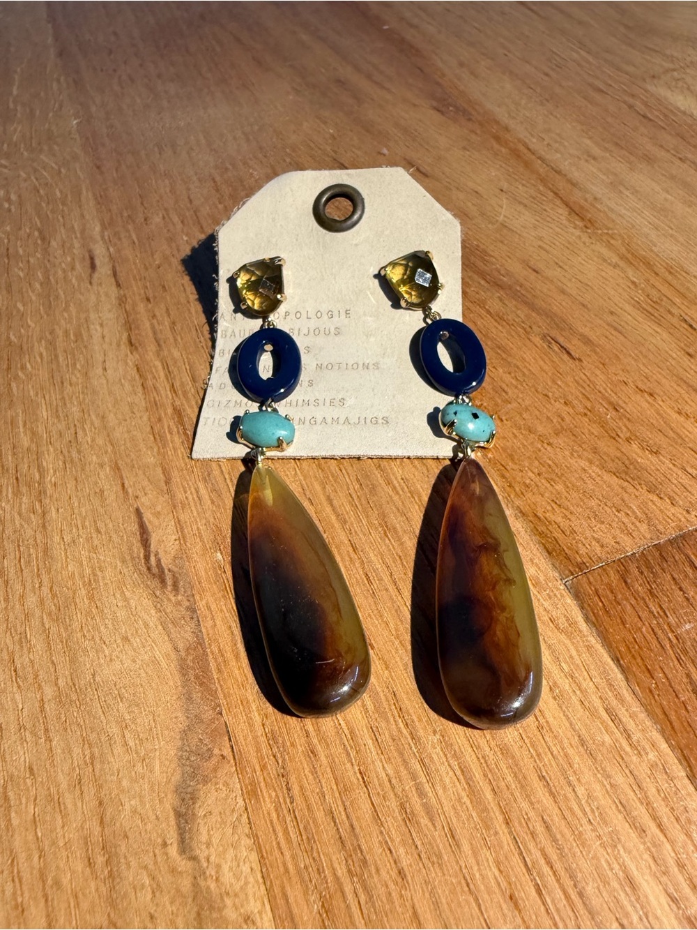 Anthropologie Mixed-Tone Teardrop Dangle Earrings with Blue and Amber Accents